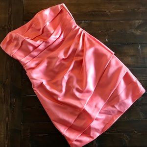 Coral colored satin David’s Bridal dress